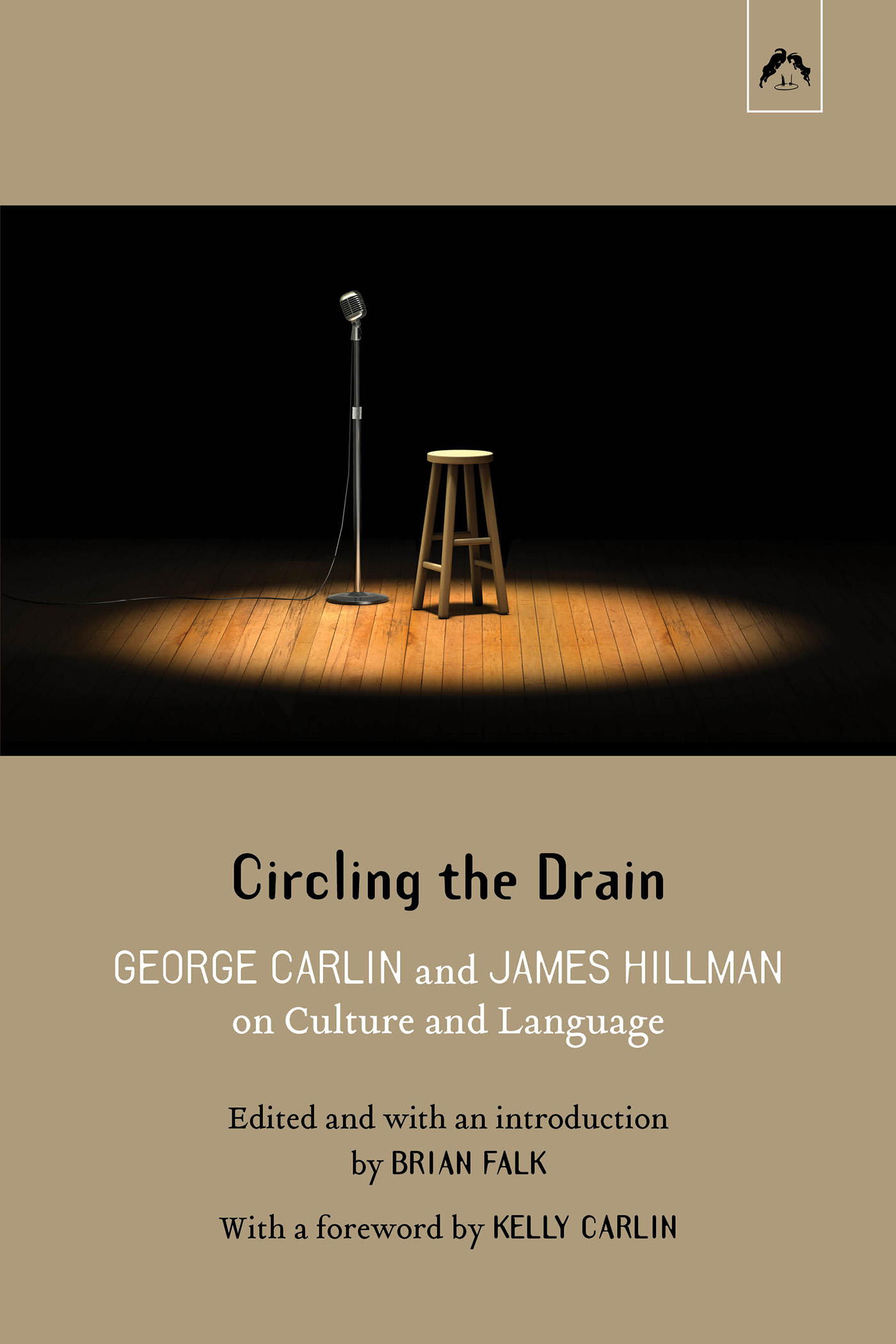 Picture of a stage with a microphone next to an empty stool